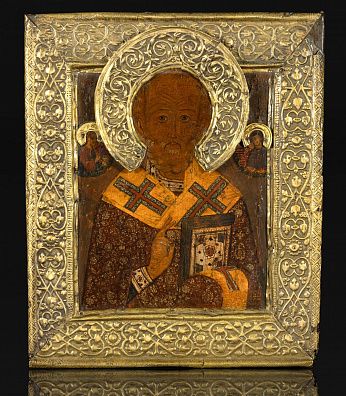 Икона "Святитель Николай Чудотворец", в басменном окладе. Середина XVII века. Реставрация XIX века. Россия.